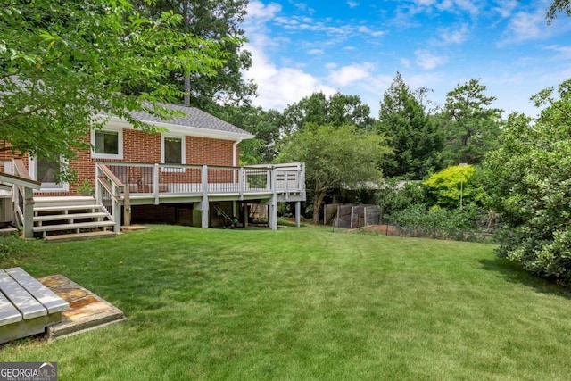 view of yard featuring a deck