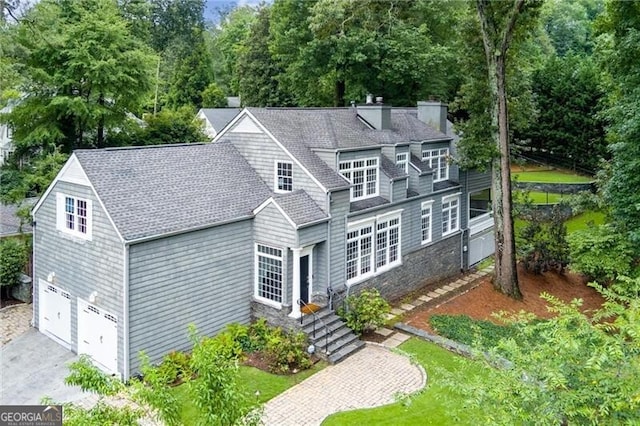 view of front of home with a garage