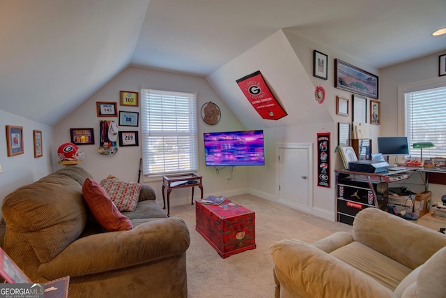 living room featuring light colored carpet and lofted ceiling