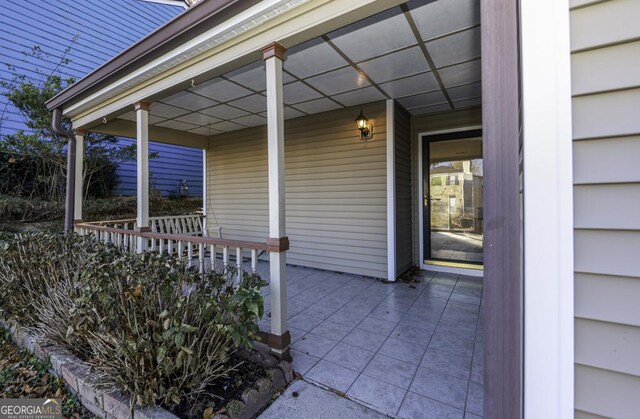 view of patio featuring a porch