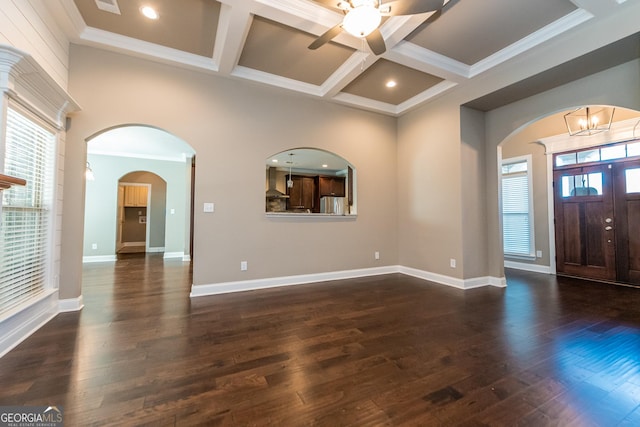 entrance foyer with coffered ceiling, ornamental molding, dark hardwood / wood-style flooring, and beamed ceiling