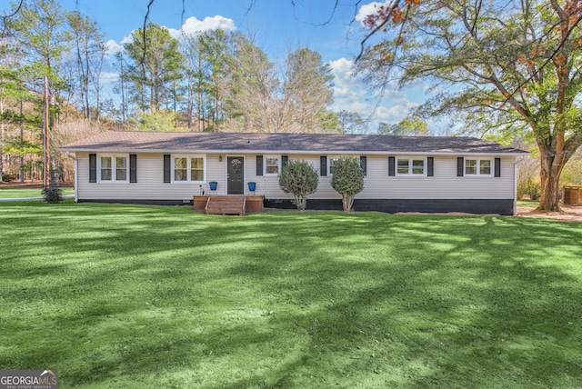 ranch-style home featuring a front lawn