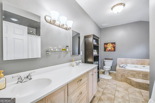 bathroom with vanity, lofted ceiling, tile patterned flooring, toilet, and tiled bath