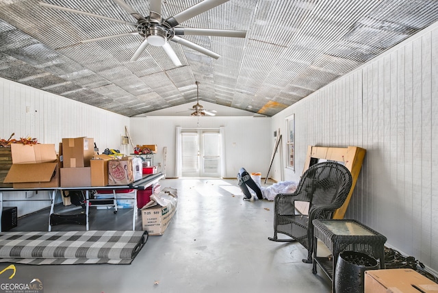 interior space with ceiling fan and french doors