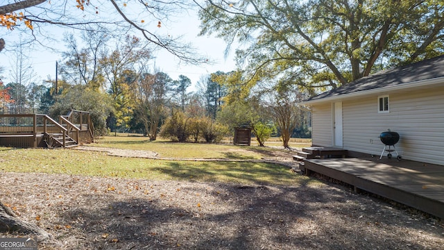 view of yard featuring a deck