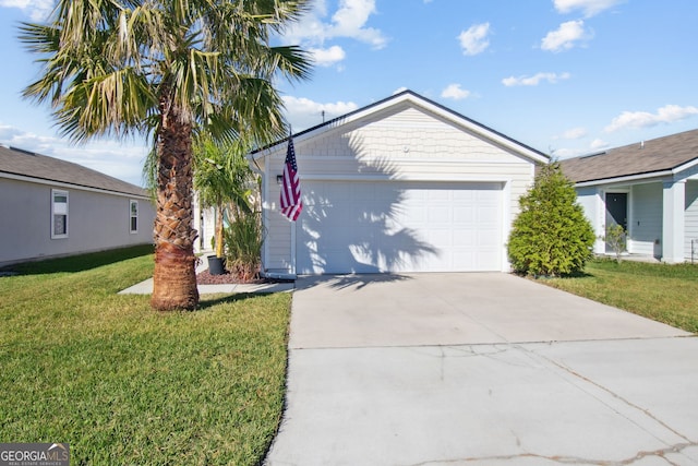 ranch-style house with a front yard and a garage