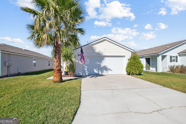 ranch-style house featuring a front yard and a garage