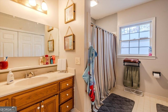 bathroom featuring vanity and tile patterned floors