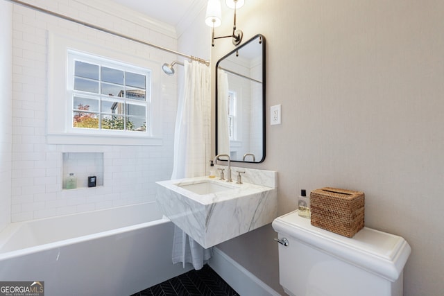 full bathroom featuring shower / bath combination with curtain, toilet, ornamental molding, and sink