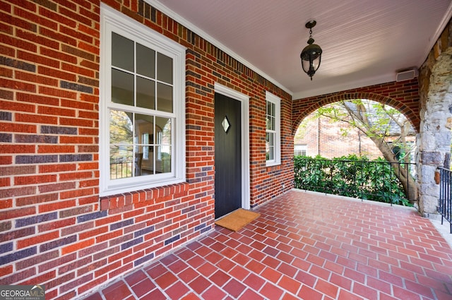 view of patio featuring a porch