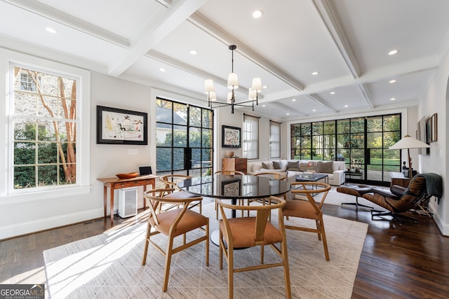 dining area featuring hardwood / wood-style floors, a notable chandelier, beam ceiling, and crown molding