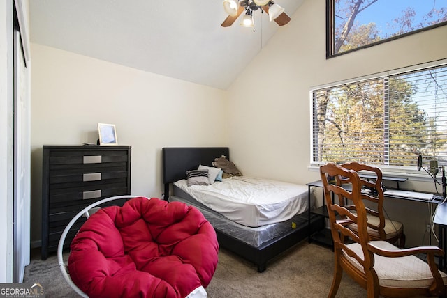 bedroom with carpet floors, ceiling fan, and high vaulted ceiling