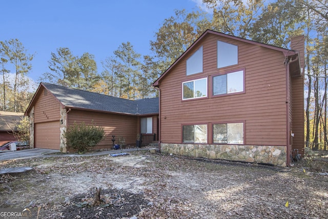 view of home's exterior with a garage