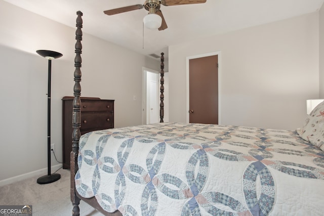 bedroom featuring ceiling fan and light colored carpet