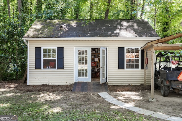 view of outbuilding with a carport