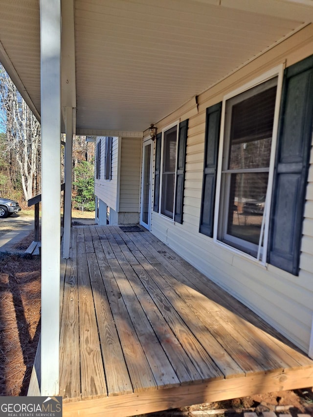 wooden deck with a porch