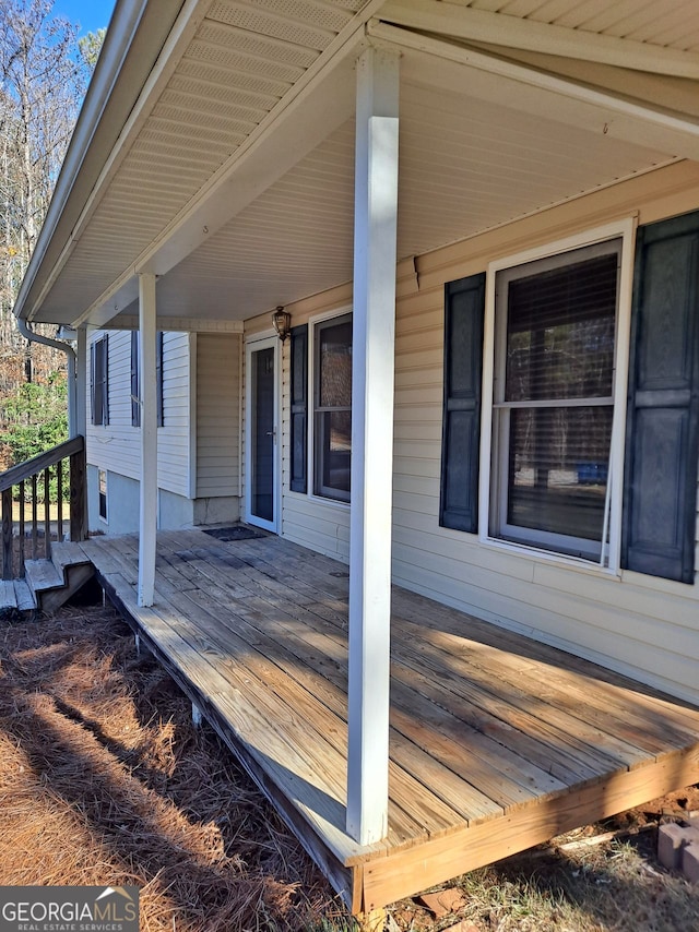 wooden terrace with covered porch