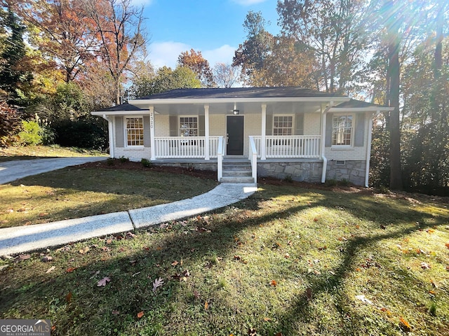 view of front of house with a porch and a front lawn