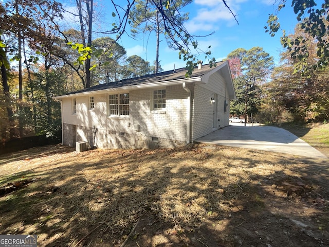 rear view of property featuring a patio