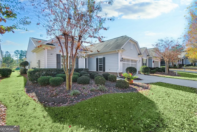 view of property exterior featuring a lawn and a garage