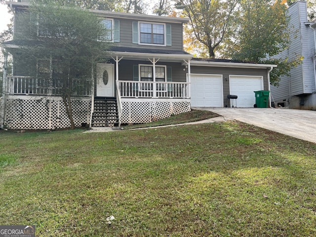 traditional-style house featuring driveway, an attached garage, a porch, and a front yard