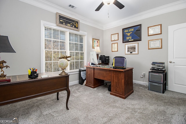 carpeted home office with crown molding and ceiling fan