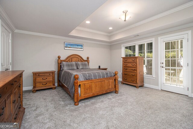 bedroom with light carpet, a raised ceiling, ceiling fan, and crown molding