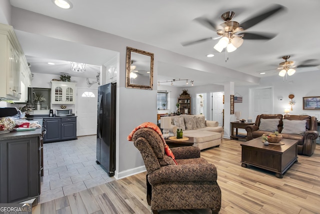 living room featuring an inviting chandelier