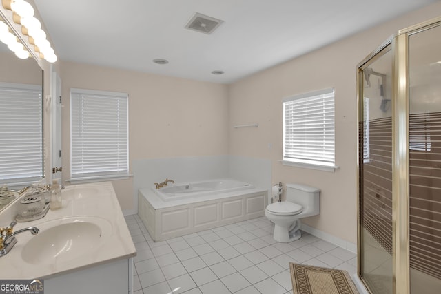 full bathroom featuring plus walk in shower, vanity, tile patterned floors, and toilet