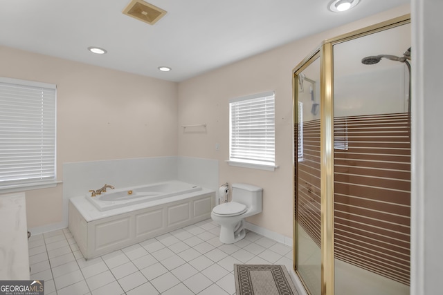 bathroom featuring tile patterned flooring, a shower stall, toilet, and a bath