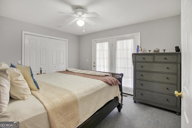 bedroom with ceiling fan, light carpet, and a closet