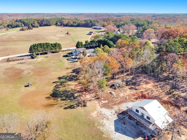 bird's eye view with a rural view and a forest view