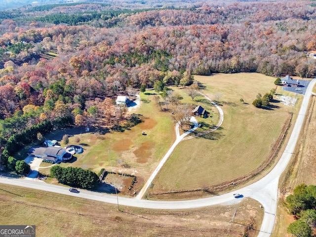 aerial view with a wooded view