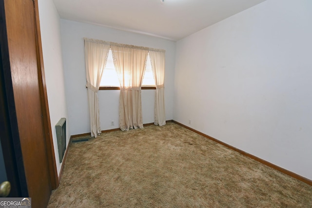 unfurnished room with carpet