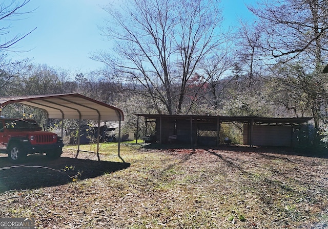 view of yard with a carport