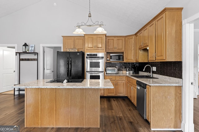 kitchen with light stone countertops, sink, a center island, dark hardwood / wood-style flooring, and black appliances