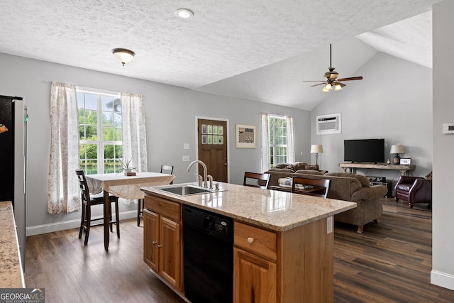 kitchen featuring vaulted ceiling, a kitchen island with sink, sink, dishwasher, and dark hardwood / wood-style floors