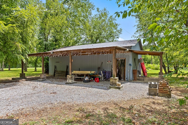 exterior space with an outbuilding