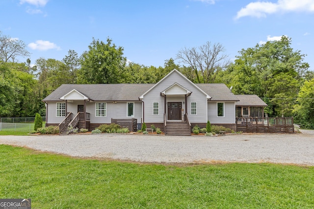 ranch-style house with a front lawn