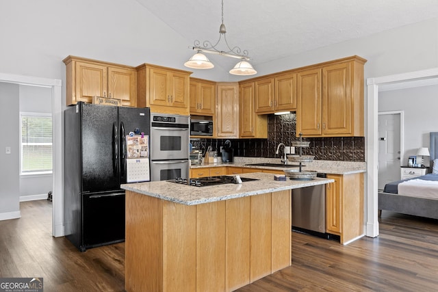 kitchen featuring black appliances, light stone countertops, dark wood-type flooring, and tasteful backsplash