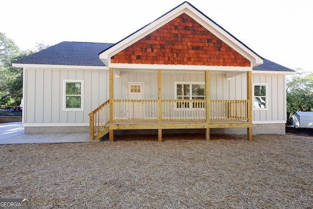 back of house with covered porch