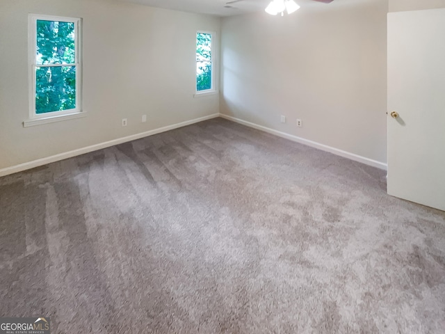 2007 Variations Dr NE, Atlanta, GA 30329 - carpeted empty room with baseboards and a ceiling fan