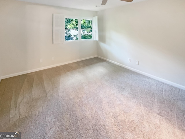 2007 Variations Dr NE, Atlanta, GA 30329 - carpeted spare room with baseboards and a ceiling fan
