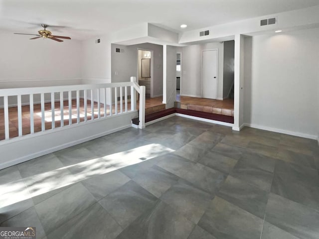 unfurnished bedroom featuring ceiling fan