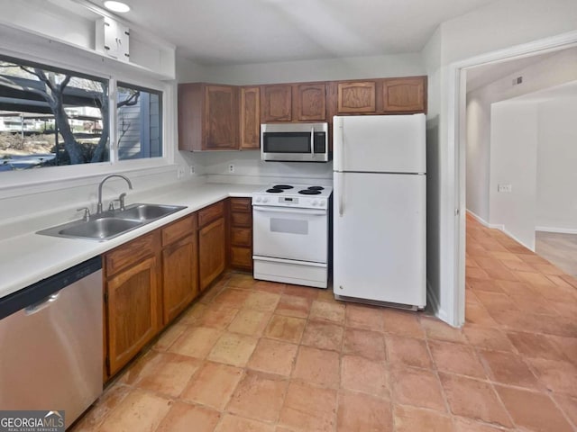 kitchen with sink and stainless steel appliances