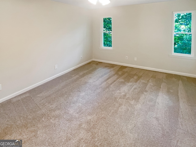 2007 Variations Dr NE, Atlanta, GA 30329 - carpeted empty room featuring baseboards