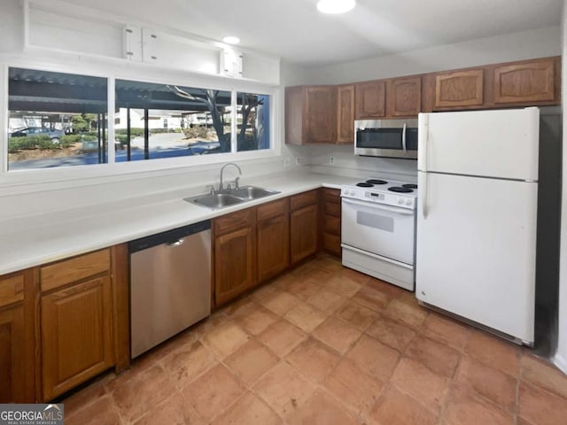 kitchen featuring stainless steel appliances and sink