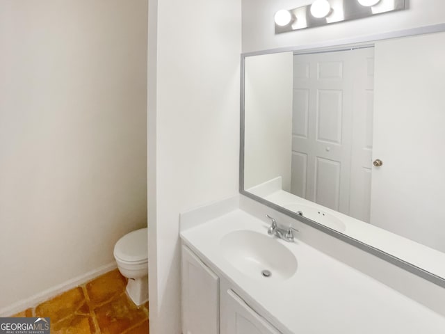 2007 Variations Dr NE, Atlanta, GA 30329 - half bath with toilet, vanity, tile patterned floors, and baseboards