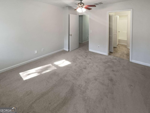 unfurnished bedroom with carpet flooring and ceiling fan