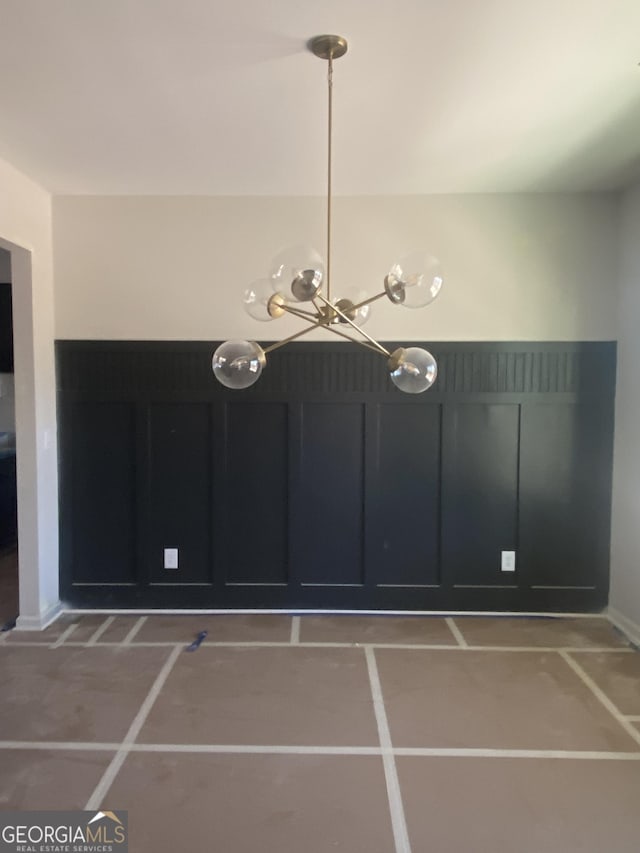 interior space with a chandelier